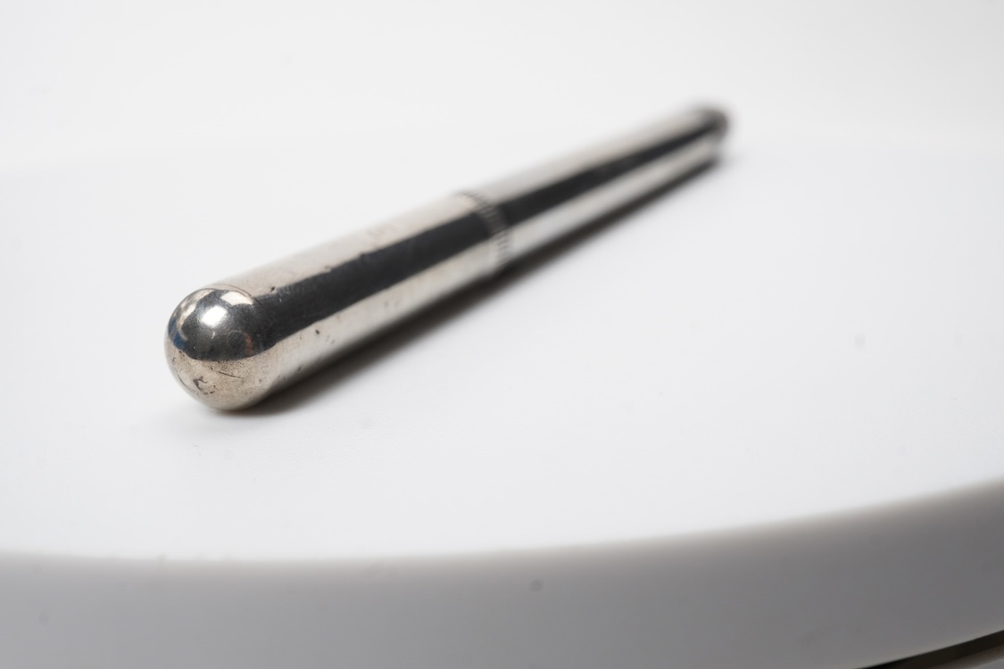 A De la Rue Onoto Sterling silver piston filler with fine flexible nib and over-and-under feed